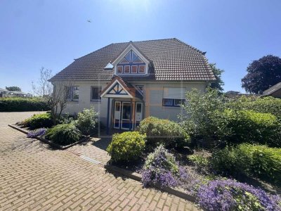 Ihr neues Zuhause mit Stil und Ruhe – Erdgeschosswohnung mit Südterrasse, Gartenanteil und hohem Woh