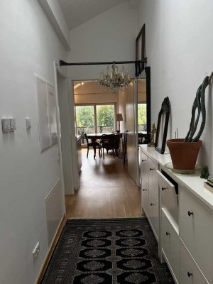 Moderne DG-Wohnung mit Balkon und TG in Münsing- teilmöbliert, befristet mit Option zur Übernahme
