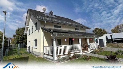 Neuwertiges Einfamilienhaus mit einladender Veranda erwartet Sie als neuen Besitzer!