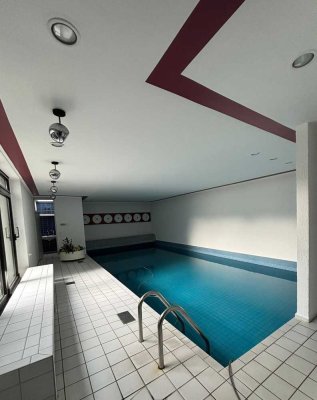 Citynahe 2-Zimmer-Wohnung – Sauna & Schwimmbad im Haus, mit Balkon & Aufzug
