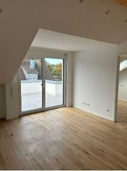 Erstbezug: 2-Zimmer-Dachgeschosswohnung mit Sonnenterrasse und Einbauküche