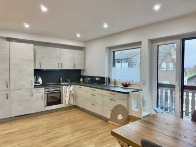 6 km bis Paderborn! Bahnhof 300 m! Moderne 58 + 20 qm Maisonette Wohnung mit Balkon in Scharmede.