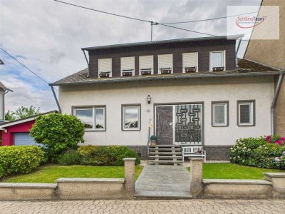 Idyllisches Einfamilienhaus mit traumhaft großem Grundstück und viel Potential