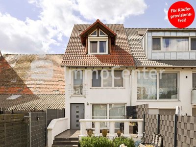 Wohnen mit Charakter: Gepflegtes Einfamilienhaus mit Garten, Kamin und Carport