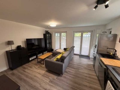 Barrierefreie EG-Wohnung mit Terasse und Garten