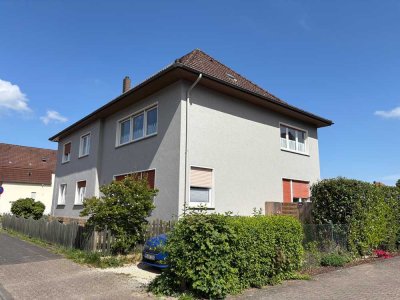 Helle Obergeschosswohnung mit Gartenanteil und Stellplatz