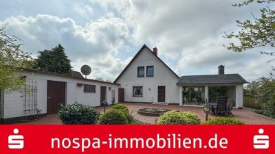 Top gepflegt! Teilunterkellertes Einfamilienhaus mit Wintergarten, Garage und Terrasse!