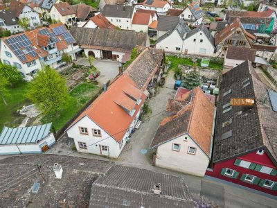 IMMORath.de - Zwei Häuser mit Baugrundstück