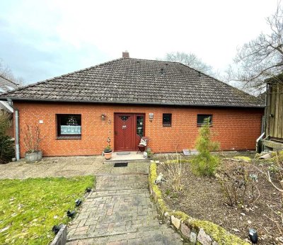Solider Winkelbungalow 6 Zi.- im Grünen