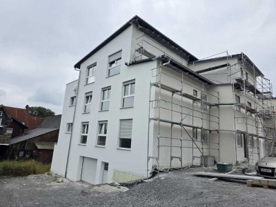 Moderne 4 Zimmerwohnung mit Balkon, Einbauküche und Neubau Charme