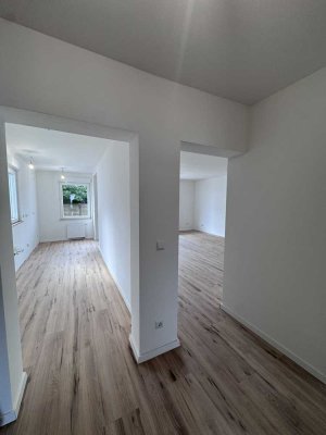 Kernsanierte Erdgeschosswohnung mit Terasse + Garten