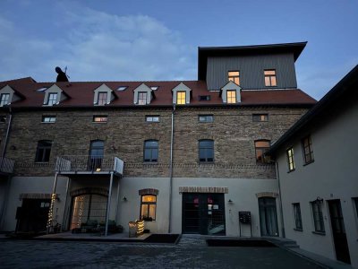 Wohnen in der historischen "Alten Mälzerei" 3 ZKB mit außergewöhnlichem Flair und Garten