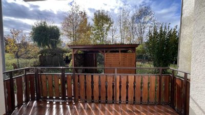 Charmante, lichtdurchflutete 3-Zimmer-Wohnung mit Garten, Garage und sonniger Südterrasse