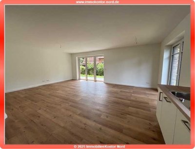 ** stilvoller NEUBAU ** im EG mit Terrasse, EBK, Carport + Keller **