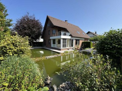 Hochwertiges Einfamilienhaus mit traumhaftem Garten und Garage in begehrter Lage von Ratheim