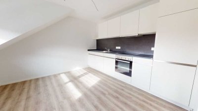 Neubau - Dachgeschosswohnung in Ortsrandlage