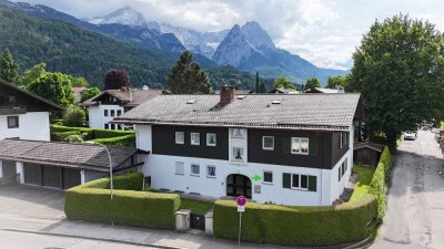 2- Zimmer, Terrasse, Alpspitzblick – und das Ganze ruhig und mitten im Ort!