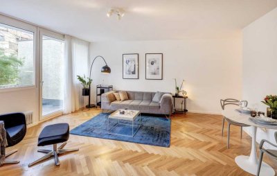 Traumlage am Isarufer - Exklusive 2 Zimmer Wohnoase mit EBK, Terrasse und Garten