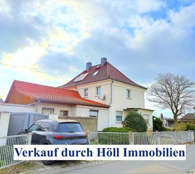 Höll Immobilien: Verkauft schöne Doppelhaushälfte mit gepflegtem Garten in Bitterfeld/Wolfen