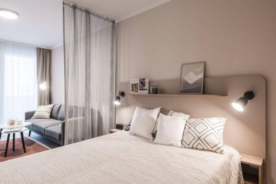 Pauschalmiete I JONN-Y möbliertes Apartment mit Balkon, inkl. Gym, Sauna, Dachterrasse, Community Area, Internet etc.! 7 Min. zum Stephansplatz!