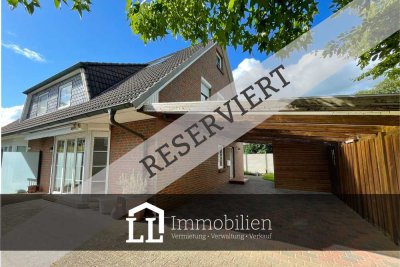 RESERVIERT: Moderne Doppelhaushälfte mit Carport.