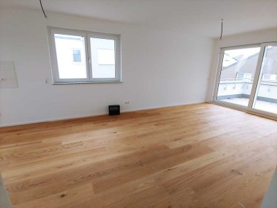 Lichtdurchflutete 3,5 Zimmerwohnung mit herrlicher Dachterrasse und hochwertiger Einbauküche