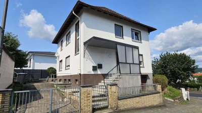 Attraktive, kernsanierte 3-Zimmer-Wohnung mit Terrasse, Gartenanteil und Garage in Gießen-Rödgen