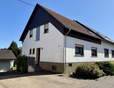 Charmante Doppelhaushälfte mit großem Grundstück in ruhiger Lage von Überherrn-Altforweiler!