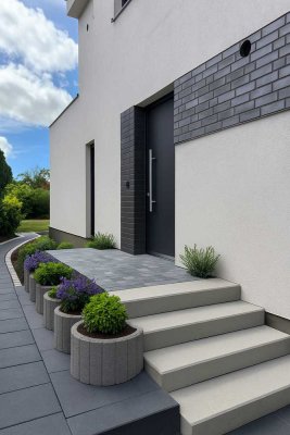 Exklusiver Erstbezug – Wohnen mit Gartenidylle & Sonnenterrasse