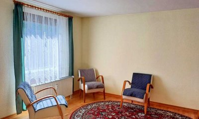 Grosszügige 2,5-Zimmer-Wohnung mit Gemeinschaftsgarten und Tiefgaragenstellplatz