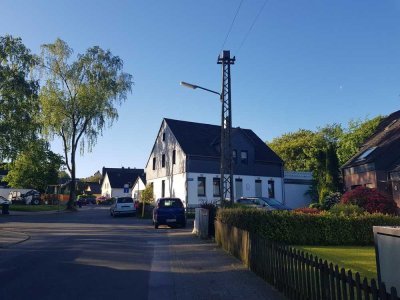 Helle Terrassen-Wohnung (EG) in Vierfamilienhaus am Waldeingang