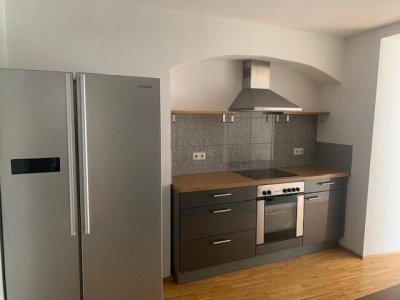 großzügige 2-Zimmer Wohnung mit Terrasse und möblierter Küche