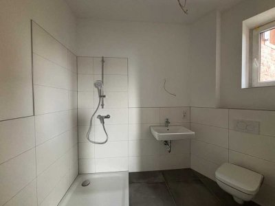 Exklusive 2,5-Zimmer-EG-Wohnung mit Altbaucharme - Erstbezug nach Kernsanierung!