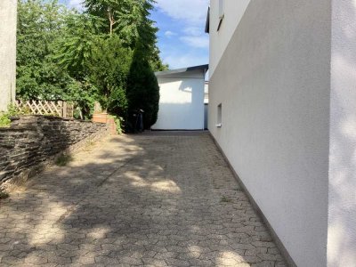 Haus mit großer Terrasse & Garage in zentraler Lage