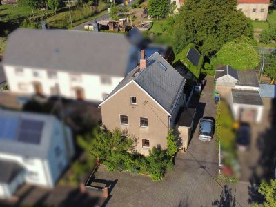 Idyllisches Einfamilienhaus mit Garten und Pacht-Obstwiese