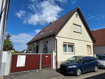 Kleines und stadtnahes Einfamilienhaus mit großem Grundstück