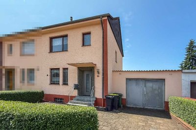 Hier steckt Potenzial – Charmante Doppelhaushälfte mit Gartenidylle und Raum für neue Id