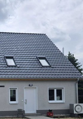 NEUBAU - Doppelhaushälfte mit Garten und Pkw-Stellfläche
