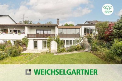 Außergewöhnliches Reiheneckhaus in schöner Hanglage mit Doppelgarage und traumhaftem Südgarten