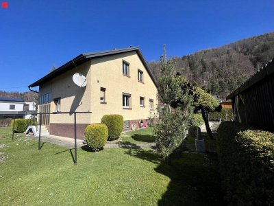 Wohnen im Grünen: Einfamilienhaus mit Garten und Tiefgarage