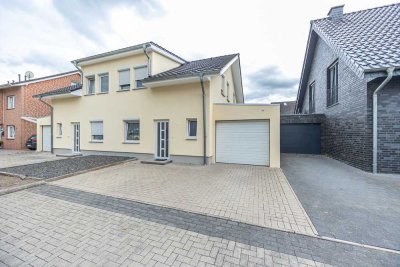 Attraktive Doppelhaushälfte mit neuer Fassade und Garage in familienfreundlicher Lage