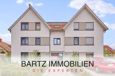 Müller-Bau: Lichtdurchflutete Dachgeschosswohnung mit Süd-Balkon, EBK & Tiefgaragenstellplatz