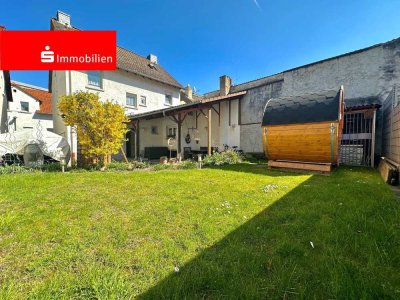 Freistehendes Einfamilienhaus mit 2 PKW-Stellplätzen - zentrale Lage!