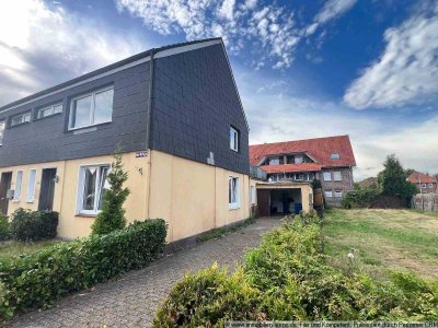 renovierungsbedürftige Haushälfte mit Garten und Garage im Zentrum von Westerstede