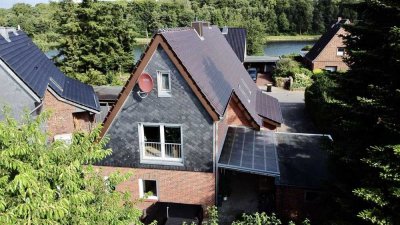 Zweifamilienhaus am Kanal - Wohnen und Mietertrag