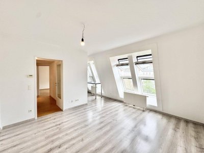 Nähe U1 | 2 Zimmer Dachgeschosswohnung mit Gemeinschaftsdachterrasse