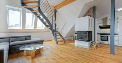 Großzügige Dachgeschosswohnung mit Terrasse in Top-Lage