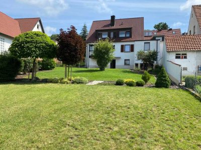 Helle 3 Zimmer Wohnung in gepflegtem Zweifamilienhaus mit Garten