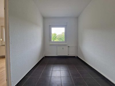 Charmante Erdgeschosswohnung mit Balkon und separater Küche!