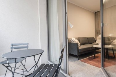 Pauschalmiete I JONN-Y möbliertes Apartment mit Balkon, inkl. Gym, Sauna, Dachterrasse, Community Area, Internet etc.! 7 Min. zum Stephansplatz!